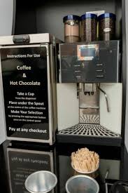 Bean to Cup Hybrid offering chocolate and milk powder options.